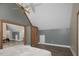 The bedroom features rustic wood accents and interesting ceilings at 3636-A Holly Grove Rd, Dunn, NC 28334