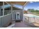Exterior view of home entrance with pool and outdoor bar area at 3636-A Holly Grove Rd, Dunn, NC 28334