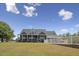 Charming two-story home with a spacious porch and manicured lawn in a serene setting at 3636-A Holly Grove Rd, Dunn, NC 28334