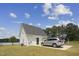 Well-maintained home with an attached garage, offering a convenient and practical layout with ample parking space at 3636-A Holly Grove Rd, Dunn, NC 28334