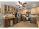 Bright kitchen featuring stainless appliances, light cabinets, and ample counter space at 3636-A Holly Grove Rd, Dunn, NC 28334