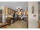 Bright kitchen featuring stainless appliances, a ceiling fan, and ample counter space at 3636-A Holly Grove Rd, Dunn, NC 28334