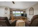 Comfortable living room with a large window and beautiful lake views, perfect for relaxation at 3636-A Holly Grove Rd, Dunn, NC 28334