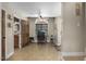 Versatile space with a home office setup and entry to a rustic bathroom at 3636-A Holly Grove Rd, Dunn, NC 28334