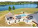 Aerial view of a beautiful pool with custom cabana, bar, and golf putting area at 3636-A Holly Grove Rd, Dunn, NC 28334