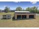 Large storage shed with multiple bays for equipment storage, enhancing property functionality at 3636-A Holly Grove Rd, Dunn, NC 28334