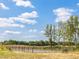 Community dog park featuring a fenced area and benches to relax at 364 Peach Grove Way, Lillington, NC 27546