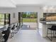 An open kitchen area with seamless access to outdoor living space at 4001 Campbell Rd, Raleigh, NC 27606