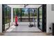 A sun room featuring multiple folding doors providing an open access to backyard at 4001 Campbell Rd, Raleigh, NC 27606