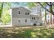 View of the back exterior and yard, showing its layout and outdoor space at 4204 Green Rd, Raleigh, NC 27604