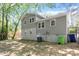 View of the back exterior and yard, demonstrating layout and potential outdoor enjoyment at 4204 Green Rd, Raleigh, NC 27604
