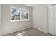Bedroom featuring carpet, a window with natural light, and neutral wall paint at 4204 Green Rd, Raleigh, NC 27604