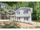Charming renovated home features a two-story layout, fresh paint, and a well-maintained front yard at 4204 Green Rd, Raleigh, NC 27604