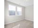 Bright bedroom features plush carpeting and natural light from large windows at 436 Golden Dragonfly St, Wake Forest, NC 27587