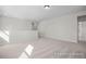 Bonus room with neutral walls and carpet flooring, perfect for customizable living space at 436 Golden Dragonfly St, Wake Forest, NC 27587