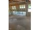 Open concept living room under construction with visible wood framing and abundant window views at 436 Golden Dragonfly St, Wake Forest, NC 27587