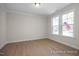 Bright study or home office featuring wood floors and natural light from the double windows at 436 Golden Dragonfly St, Wake Forest, NC 27587