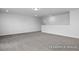 Bright bonus room featuring recessed lights and plush carpet at 440 Golden Dragonfly St, Wake Forest, NC 27587