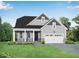 New home with a welcoming front porch, two-car garage, lush green lawn, and neutral toned facade at 440 Golden Dragonfly St, Wake Forest, NC 27587