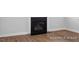 Close up on a modern gas fireplace with black trim at 440 Golden Dragonfly St, Wake Forest, NC 27587