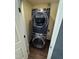 Modern stacked washer and dryer set in a conveniently located laundry area at 4910 Briarstone Ct, Raleigh, NC 27610
