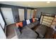 Living room featuring hardwood flooring, sliding door, and neutral colored furniture at 4910 Briarstone Ct, Raleigh, NC 27610