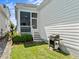 The backyard includes a grill, and a screened-in porch at 5217 Beckom St, Raleigh, NC 27616