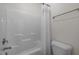 Clean bathroom featuring a shower with a white shower curtain at 5217 Beckom St, Raleigh, NC 27616