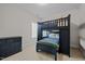 Charming bedroom featuring a blue bunk bed, a chest of drawers and a cozy atmosphere at 5217 Beckom St, Raleigh, NC 27616