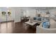 Bright, open-concept living area seamlessly connects to the dining and kitchen, featuring hardwood floors and stylish decor at 5217 Beckom St, Raleigh, NC 27616