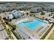 An aerial view showcasing the community pool with ample seating at 5217 Beckom St, Raleigh, NC 27616