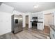 Well-lit kitchen featuring stainless steel appliances and light gray cabinets with modern countertops at 5346 Deep River Rd, Sanford, NC 27330