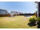Spacious backyard featuring a playground, fire pit, and ample space for outdoor activities and entertainment at 536 Adkins Ridge Rd, Rolesville, NC 27571
