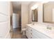 Bright bathroom with a double sink vanity, modern fixtures, and neutral walls at 536 Adkins Ridge Rd, Rolesville, NC 27571