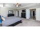 This spacious main bedroom features plush carpeting, neutral walls, and an adjoining bathroom at 536 Adkins Ridge Rd, Rolesville, NC 27571
