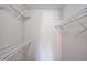 Walk-in closet featuring multiple rows of white wire shelving at 5414 Stanley Rd, Durham, NC 27704