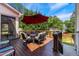 Outdoor patio with table, chairs and umbrella at 55 Fleming Forest Dr, Youngsville, NC 27596