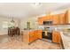 Efficient kitchen featuring a breakfast bar, stainless appliances, and an open layout to adjacent rooms at 5600 Sherrif W Pl, Raleigh, NC 27610