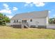Backyard showcasing the deck, white vinyl fence, and the home's siding at 5612 Sandy Trail Dr, Knightdale, NC 27545