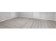 Finished basement with neutral carpet, clean lines and recessed lighting at 5612 Sandy Trail Dr, Knightdale, NC 27545