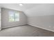 Bright bedroom with neutral carpet, natural light, and an airy feel at 5612 Sandy Trail Dr, Knightdale, NC 27545