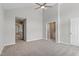 Spacious main bedroom featuring vaulted ceiling, ceiling fan, and an ensuite bathroom entrance at 5612 Sandy Trail Dr, Knightdale, NC 27545
