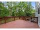 Spacious wooden deck offers beautiful views of the wooded backyard at 568 Piney Mountain Rd, Chapel Hill, NC 27514