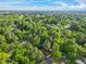Aerial view of the neighborhood with lush trees, providing a sense of community and nature at 5701 Hadrian Dr Dr, Durham, NC 27703