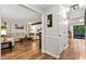 Bright and airy living room featuring beautiful hardwood floors and a cozy fireplace at 5701 Hadrian Dr Dr, Durham, NC 27703
