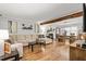 Spacious living room seamlessly transitions into a dining area, highlighted by hardwood floors at 5701 Hadrian Dr Dr, Durham, NC 27703