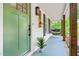 Inviting covered porch featuring a hanging swing and charming accents at 5701 Hadrian Dr Dr, Durham, NC 27703