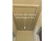 Attic access panel featuring pull-down steps for convenient access and extra storage at 5825 Scalybark Rd, Durham, NC 27712