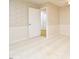 Neutral room featuring a door and classic flooring at 5825 Scalybark Rd, Durham, NC 27712