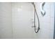 Shower featuring standard fixtures and tiling at 5825 Scalybark Rd, Durham, NC 27712